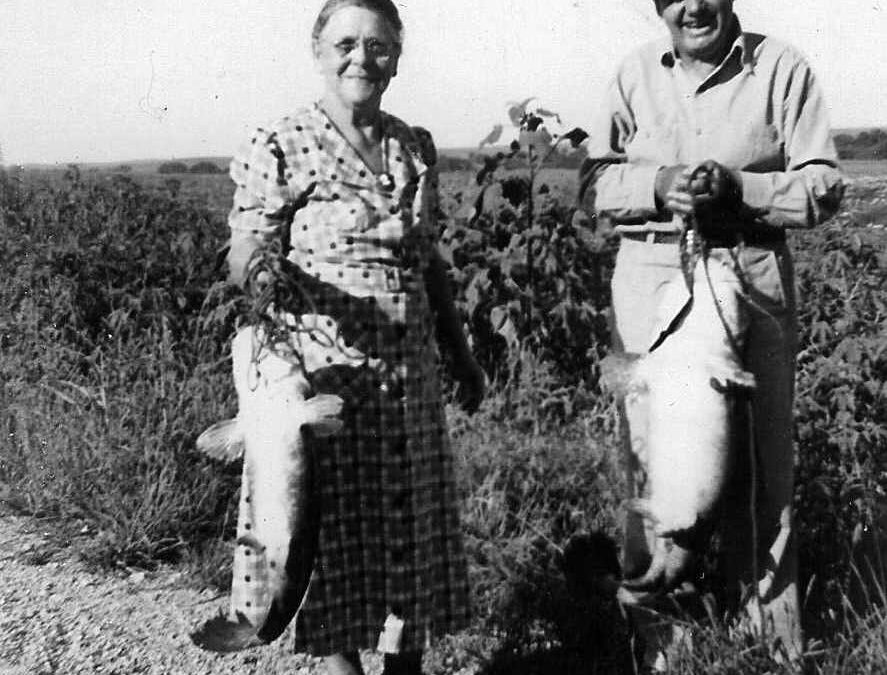 1951, Aug 7, Maude and Henry with 12# blue and 32# yellow catfish caught by friends in South Fork, a month after flood
