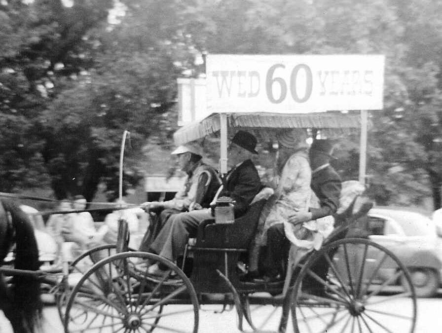 1961 Rodeo parade, 90 yr old surrey with fringe on top, Henry and Maud Rogler with Stauffers