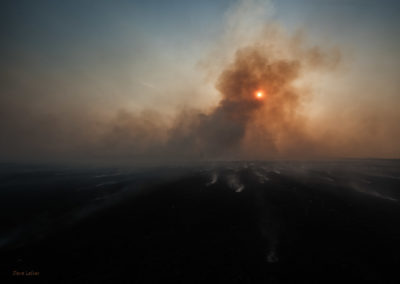 Praire burn smoke darkening the sky