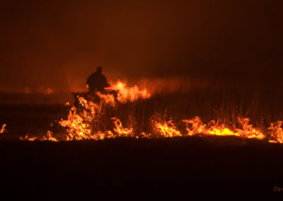 ATV riding through flames