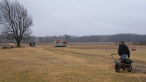 Volunteer working the grounds of Pioneer BLuffs